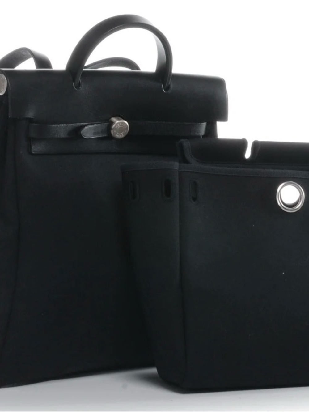Black HERMÈS Her Bag Ado 2 in 1 handbag and backpack.